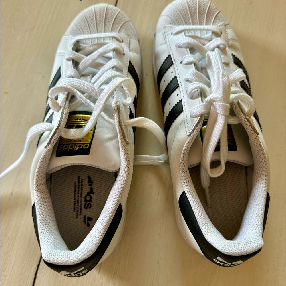 Cloud White/navy/Cloud White adidas superstar sneaker size 5.5 equivalent to a 7